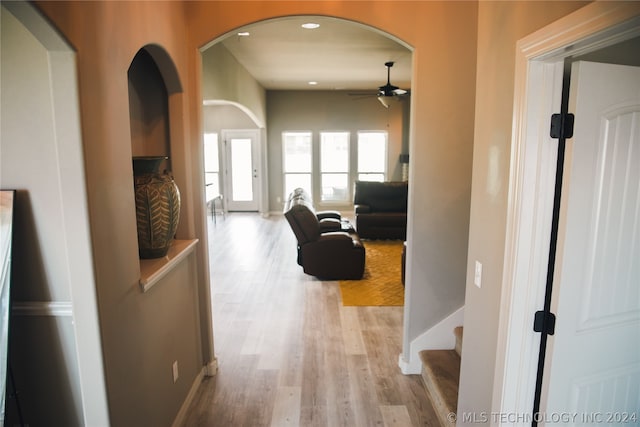 corridor featuring light hardwood / wood-style floors