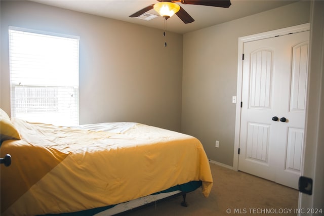 bedroom with carpet floors and ceiling fan