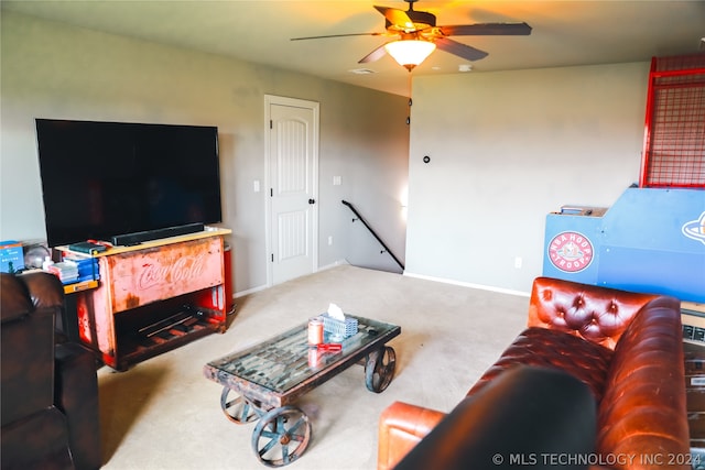 carpeted living room featuring ceiling fan