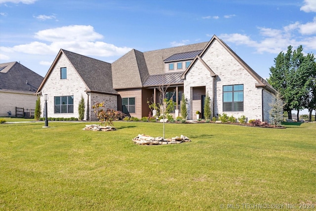 view of front of property with a front lawn