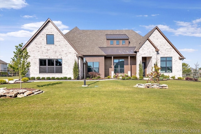 view of front facade with a front yard