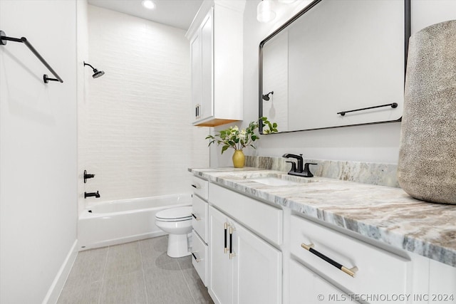 full bathroom featuring vanity, toilet, tile patterned floors, and tiled shower / bath combo