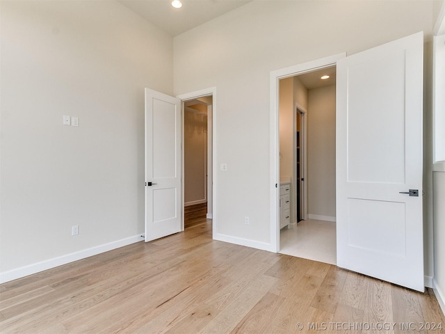 unfurnished bedroom featuring light hardwood / wood-style floors