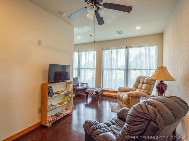 living room featuring ceiling fan