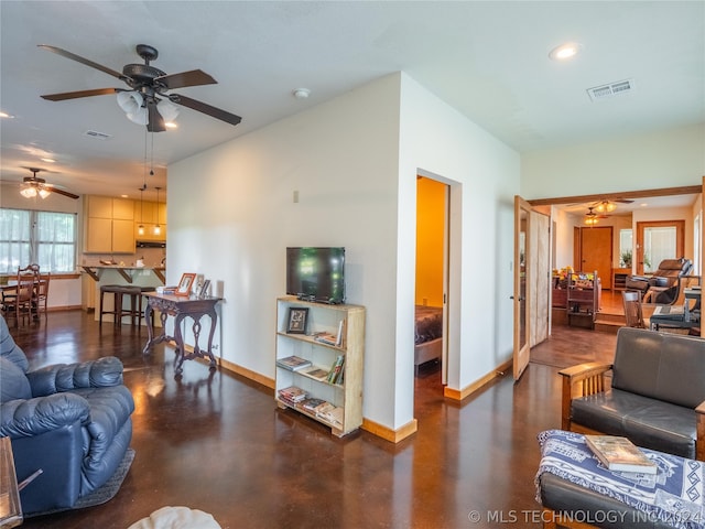 living room featuring ceiling fan