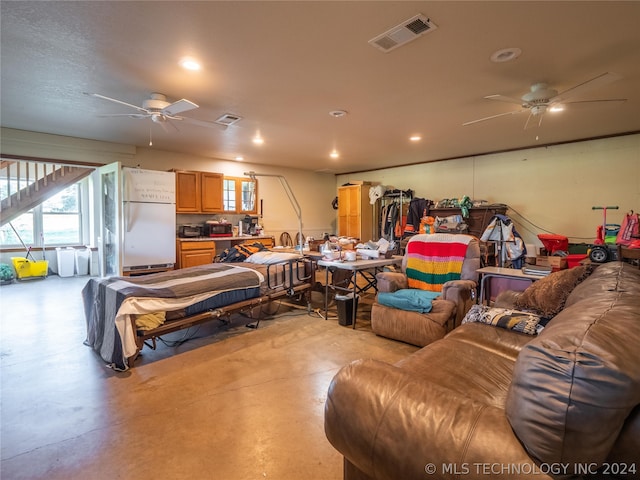 interior space featuring ceiling fan