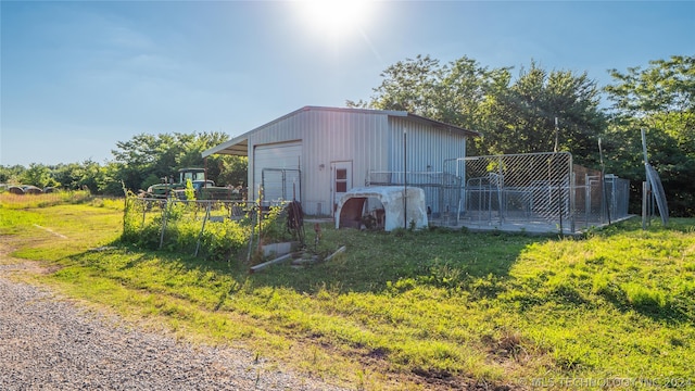 view of outbuilding with a garage