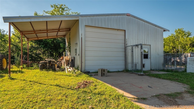 view of outdoor structure with a garage