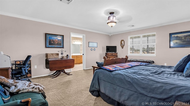 carpeted bedroom with ensuite bathroom, ceiling fan, and ornamental molding