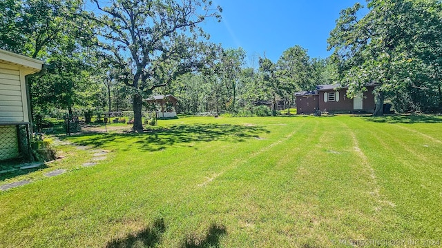 view of yard featuring fence