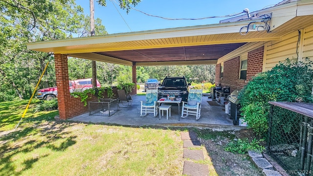 view of patio / terrace featuring a carport