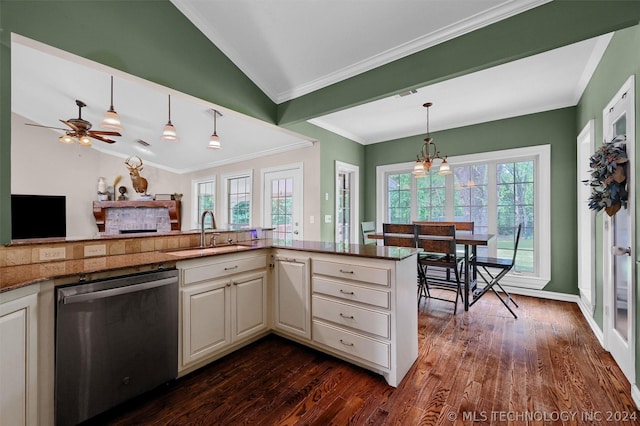 kitchen featuring kitchen peninsula, stainless steel dishwasher, vaulted ceiling, dark wood-type flooring, and sink