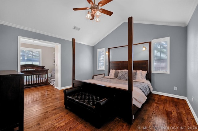 bedroom with ceiling fan, crown molding, hardwood / wood-style floors, and vaulted ceiling