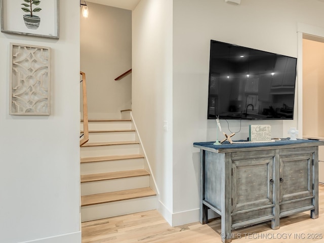 75 Lower Green Way, Carlton Landing, OK 74432 - stairs featuring wood finished floors and baseboards