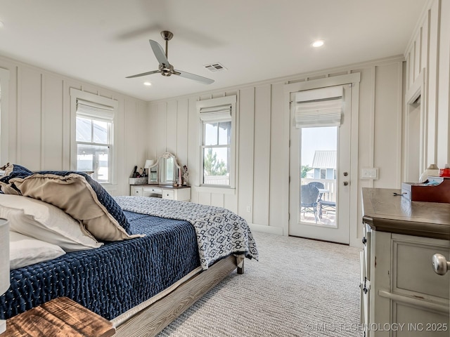 75 Lower Green Way, Carlton Landing, OK 74432 - carpeted bedroom with a decorative wall, access to outside, and a ceiling fan