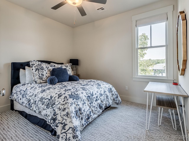 75 Lower Green Way, Carlton Landing, OK 74432 - bedroom featuring multiple windows, baseboards, carpet floors, and ceiling fan