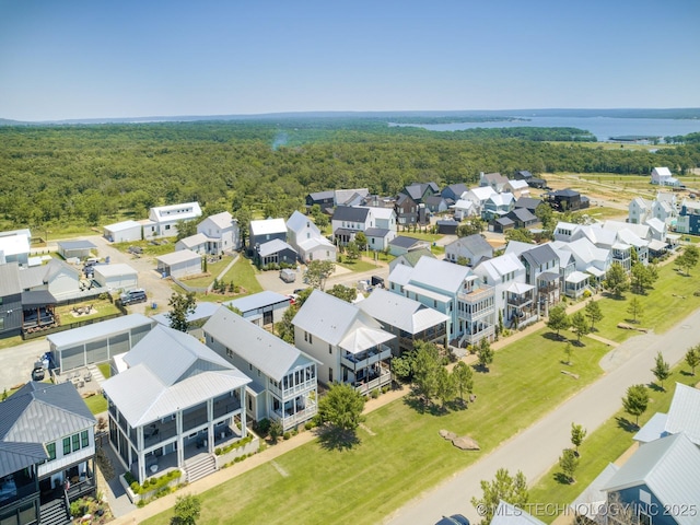 75 Lower Green Way, Carlton Landing, OK 74432 - aerial perspective of suburban area featuring a heavily wooded area