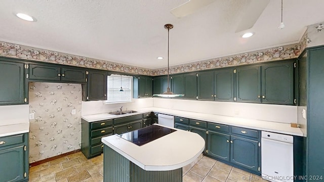 kitchen featuring black electric stovetop, sink, pendant lighting, and white dishwasher