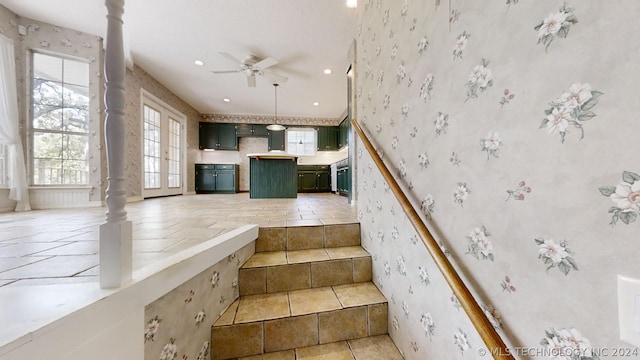 staircase with ceiling fan