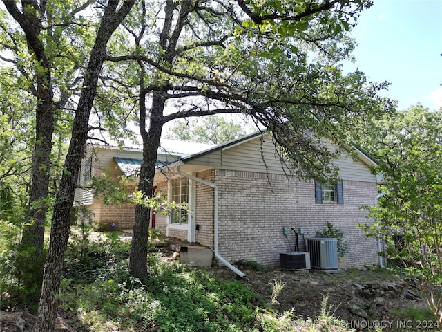 view of property exterior featuring cooling unit