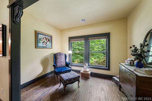 living area featuring dark hardwood / wood-style flooring