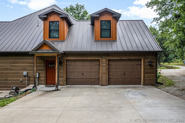 view of front of home with a garage