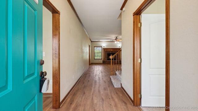 1805 College Park Rd, Claremore, OK 74017 - hallway featuring wood finished floors, baseboards, and stairway