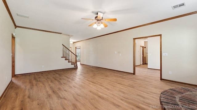 1805 College Park Rd, Claremore, OK 74017 - unfurnished living room with crown molding, light wood-style flooring, a ceiling fan, baseboards, and stairway