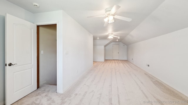 1805 College Park Rd, Claremore, OK 74017 - additional living space with light carpet, ceiling fan, and vaulted ceiling
