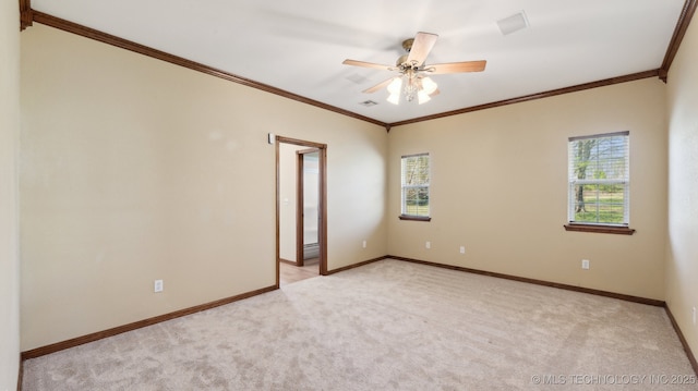 1805 College Park Rd, Claremore, OK 74017 - unfurnished room with plenty of natural light, light colored carpet, baseboards, and ornamental molding
