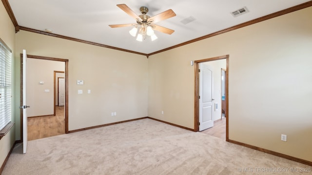 1805 College Park Rd, Claremore, OK 74017 - spare room with light carpet, crown molding, ceiling fan, and baseboards
