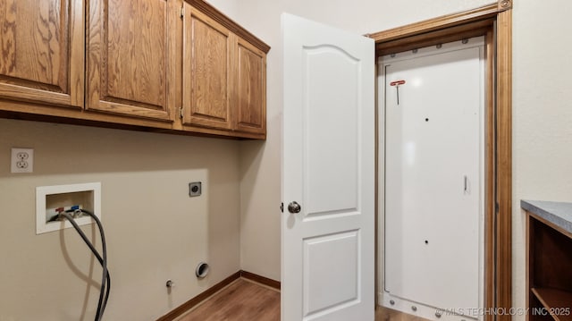 1805 College Park Rd, Claremore, OK 74017 - washroom with cabinet space, hookup for a washing machine, gas dryer hookup, light wood finished floors, and hookup for an electric dryer