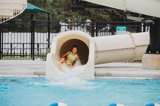 7001 E Oakland St, Broken Arrow, OK 74014 - swimming pool featuring a water slide