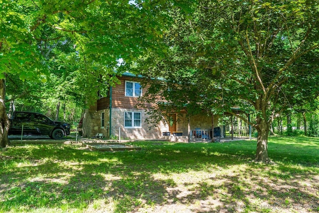 9596 N 447th Rd, Spavinaw, OK 74366 - view of front of house with a front lawn and stone siding