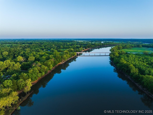 9596 N 447th Rd, Spavinaw, OK 74366 - drone / aerial view of a heavily wooded area and a large body of water