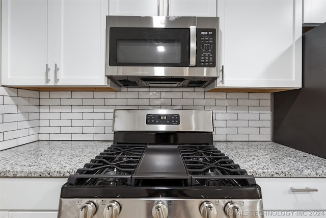 kitchen with white cabinets and stainless steel appliances