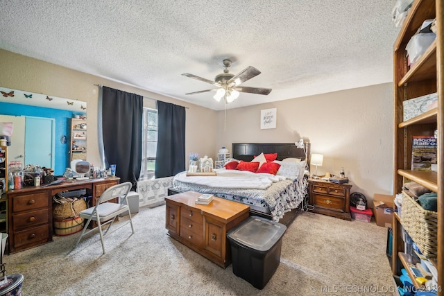 bedroom with light carpet, a textured ceiling, and ceiling fan