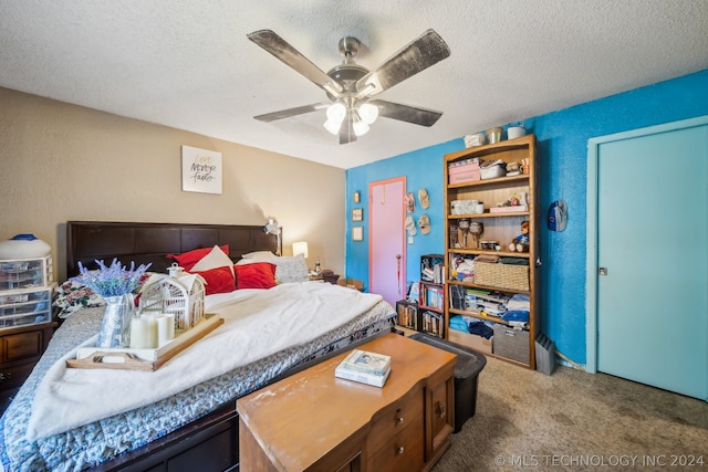 bedroom with carpet flooring, a textured ceiling, and ceiling fan