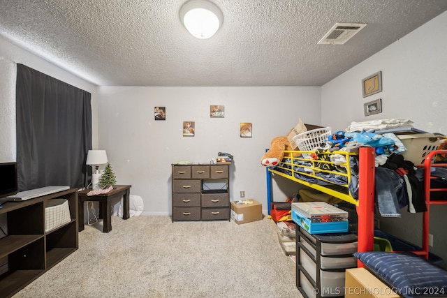 interior space featuring a textured ceiling