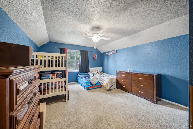 bedroom with a textured ceiling, ceiling fan, vaulted ceiling, and light colored carpet