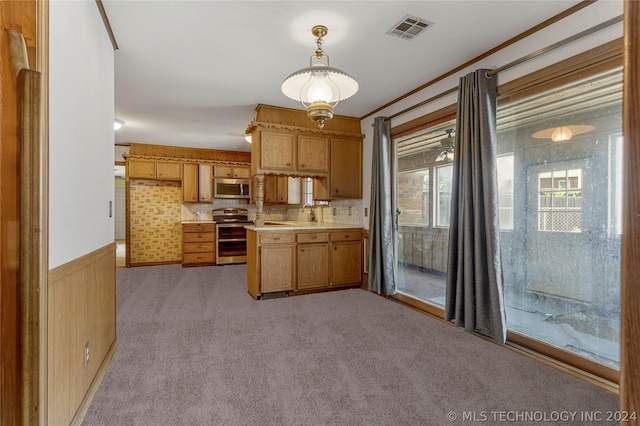 kitchen featuring stainless steel appliances, backsplash, pendant lighting, light colored carpet, and ornamental molding