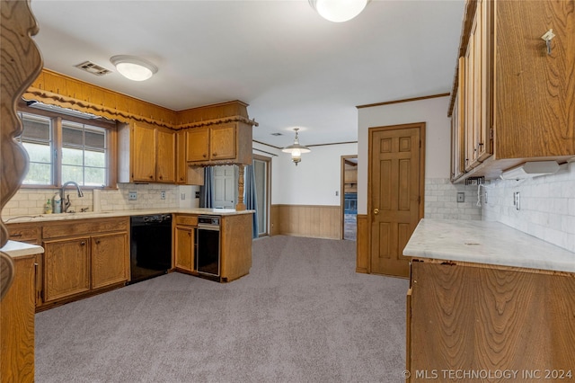 kitchen with dishwasher, crown molding, sink, and light carpet