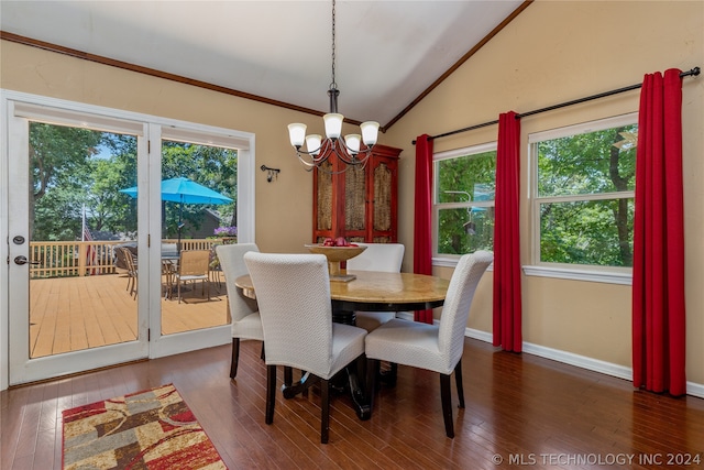 dining area featuring a notable chandelier, dark hardwood / wood-style flooring, crown molding, and lofted ceiling