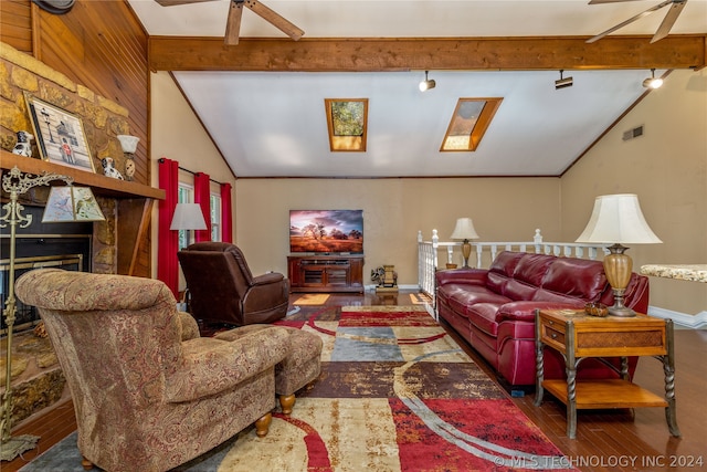 living room featuring hardwood / wood-style floors, wooden walls, ceiling fan, and lofted ceiling