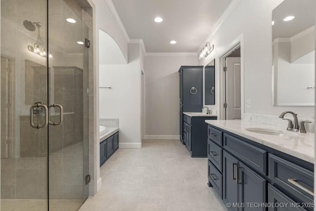 bathroom featuring vanity, crown molding, and a shower with shower door