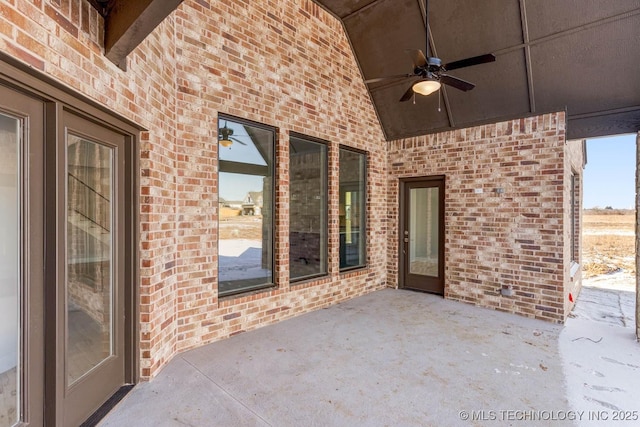 view of patio featuring ceiling fan