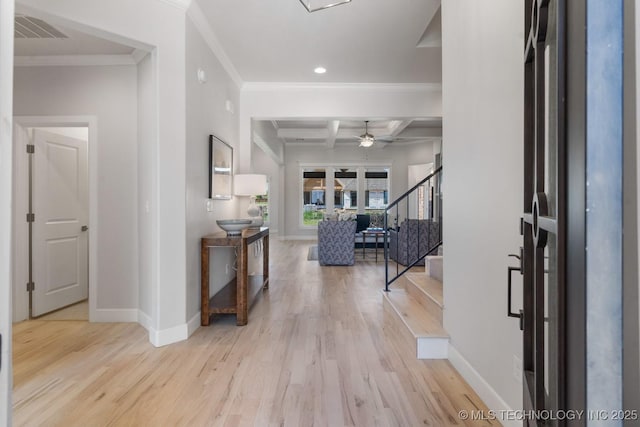 entryway featuring baseboards, wood finished floors, visible vents, stairway, and coffered ceiling