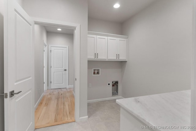 clothes washing area with cabinet space, recessed lighting, electric dryer hookup, and washer hookup