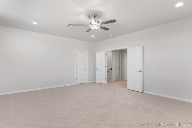 unfurnished bedroom featuring visible vents, baseboards, light colored carpet, recessed lighting, and a ceiling fan