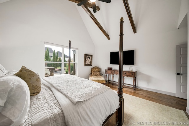 bedroom featuring beamed ceiling, high vaulted ceiling, ceiling fan, and wood-type flooring